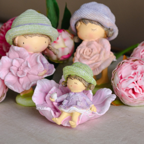 Фигурка "Девочка на цветке" 9 см, лиловая