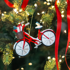 Новогодняя игрушка "Птичка на велосипеде" 12 см