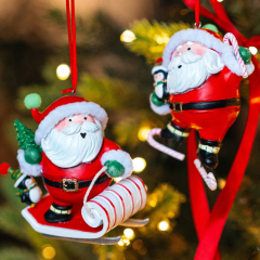 Новогодняя игрушка "Санта с пингвином на коньках" 10,2 см